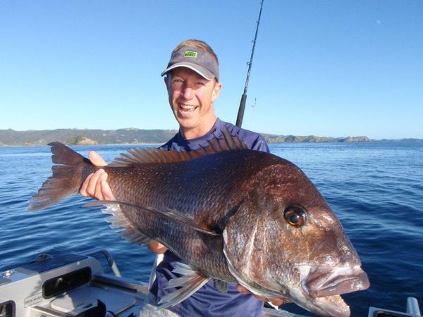 Matt Watson holds tight to one of his prized catches